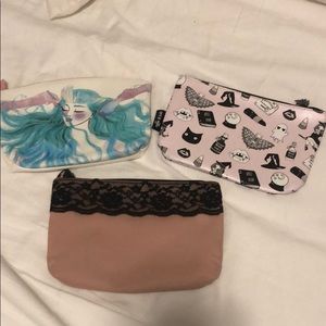 Three Ipsy bags/ pouches-